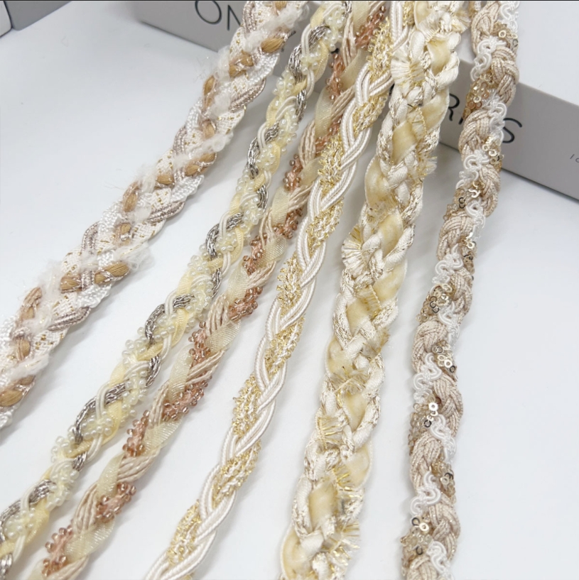 Chanel styles lace briaded trimmings used as decorative accessories for clothing 